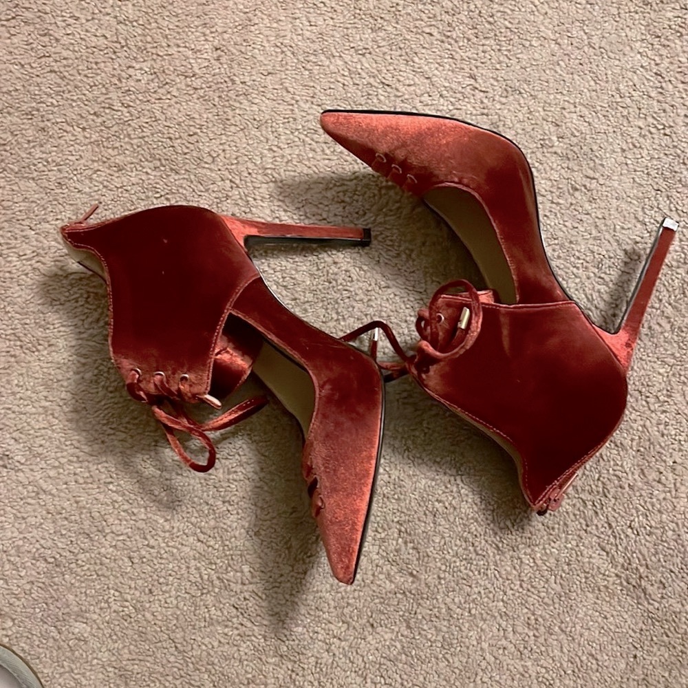 Nine West Velvet Bootie styled lace up pump.